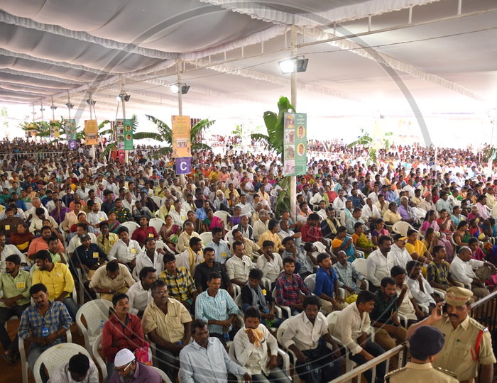 Crowd Of People Attending and Sitting In a Meeting By Andhra Pradesh Meeting