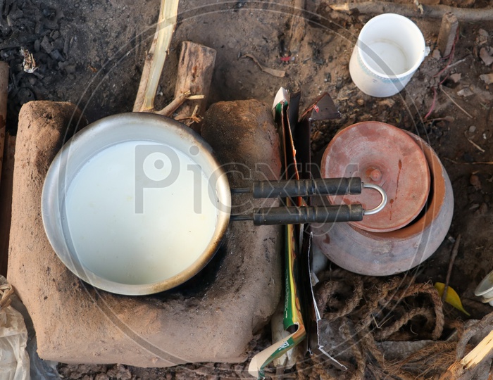 Tea Making  Ob Traditional Clay Stove With Fuel As Wooden Sticks
