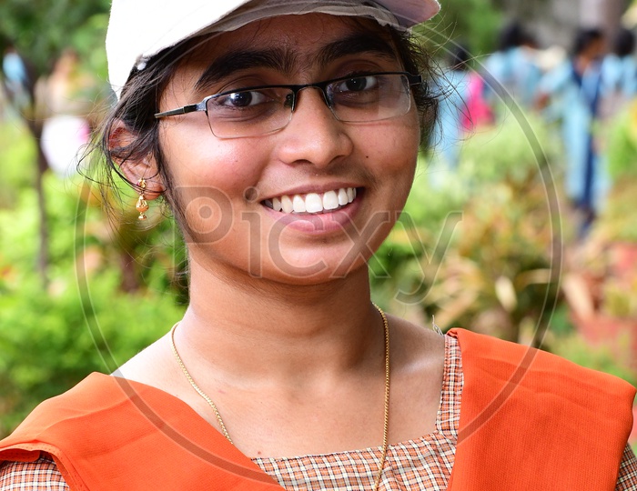 Indian School Girls And Eco Club Members  Wearing Caps