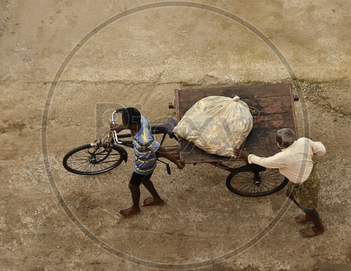 Image of Fisherman Carrying Their Catch of Fish In a Rickshaw-IE229215 ...