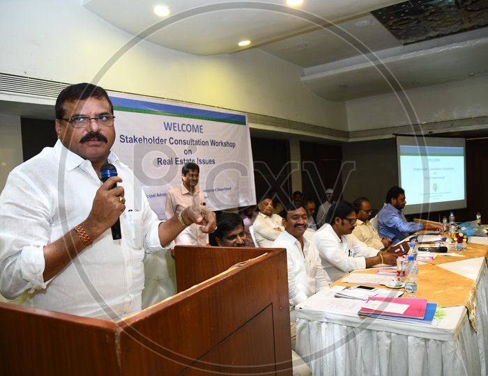 Botsa Satyanarayana addressing a speech during Stakeholder Consultation Workshop in Vijayawada