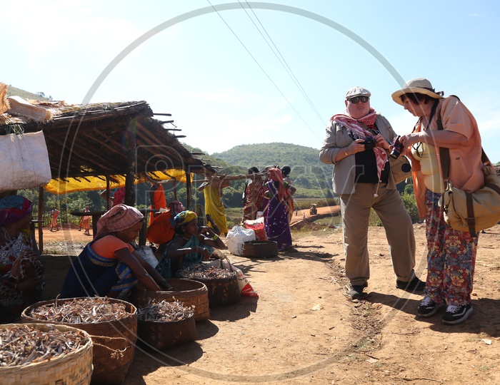 Foreigners Or Tourists Documenting The Bonda Tribes Lifestyle  At Local Flea Markets  in Tribal Villages At Andhra odisha Border