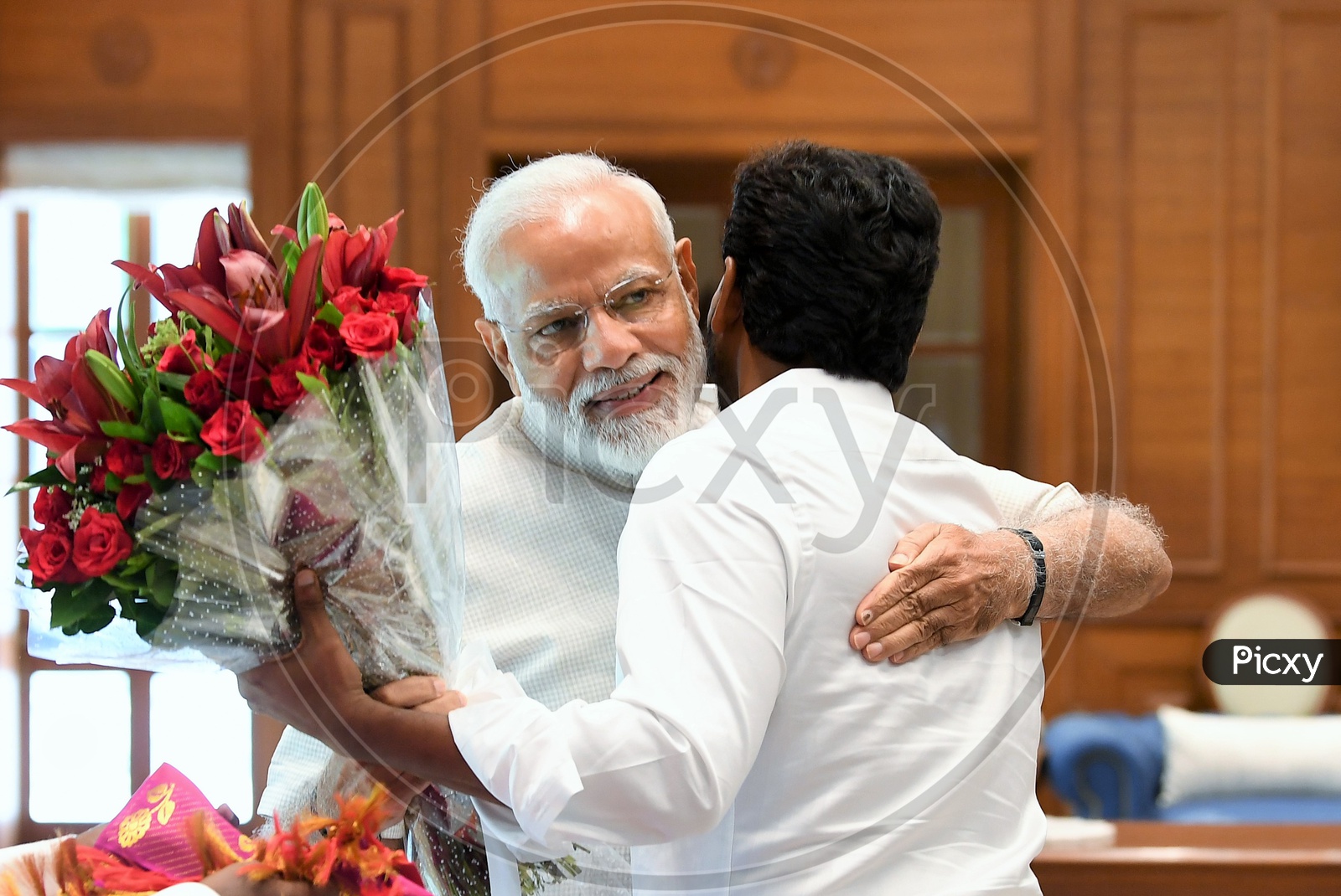 PM Narendra Modi hugging AP CM YS Jagan Mohan Reddy