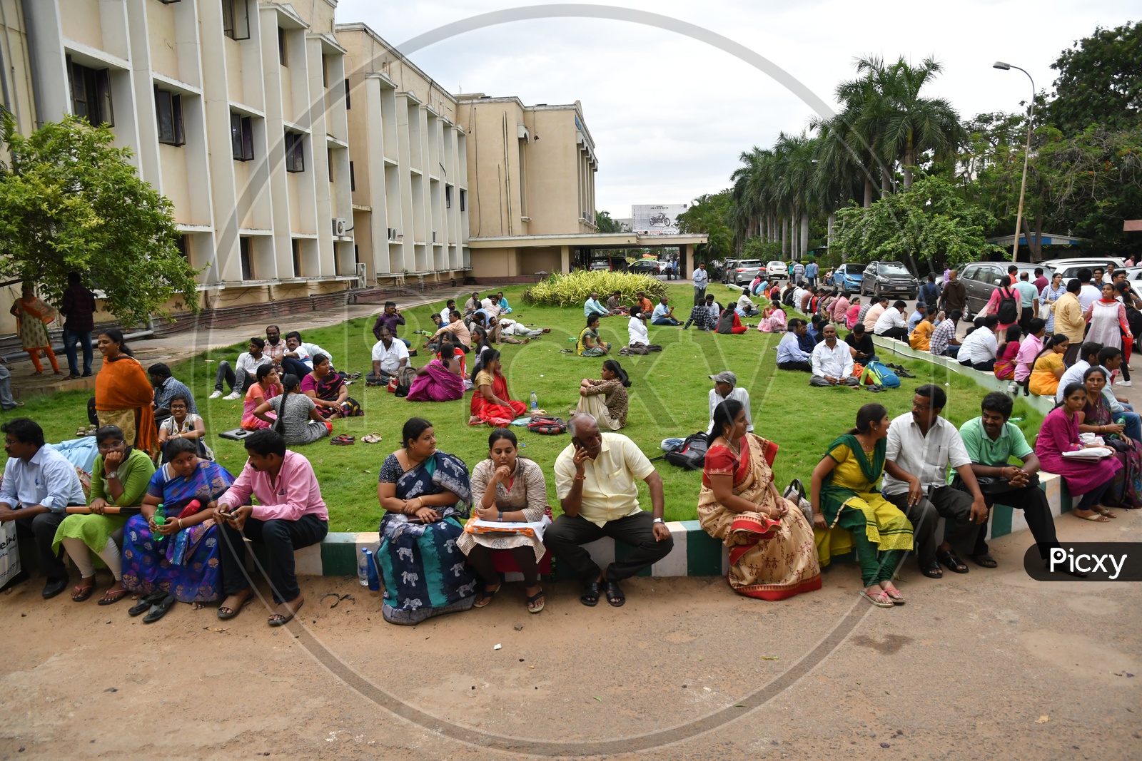 Parents and Students waiting by the lawn during AP MBBS Counselling