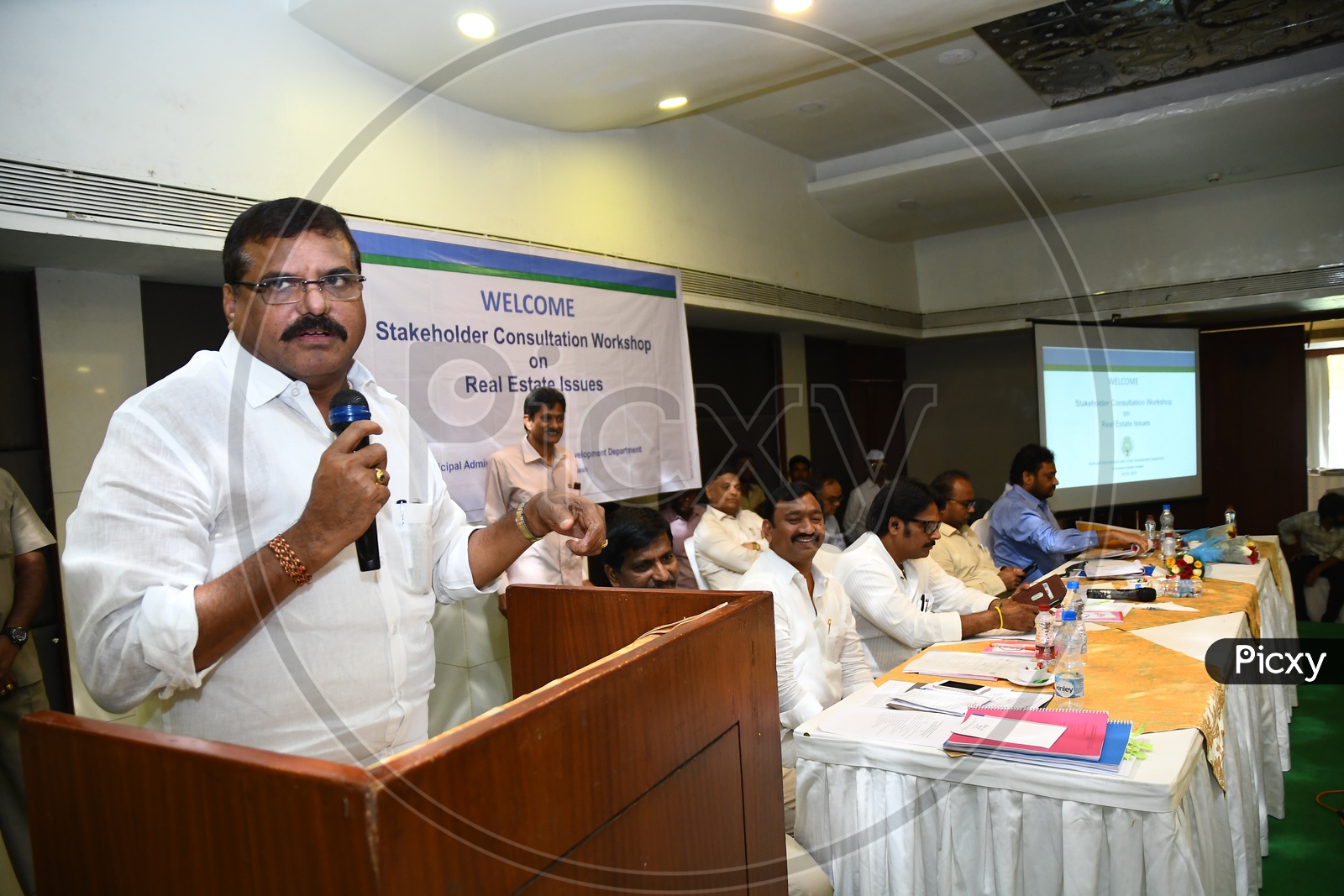 Botsa Satyanarayana addressing a speech during Stakeholder Consultation Workshop in Vijayawada