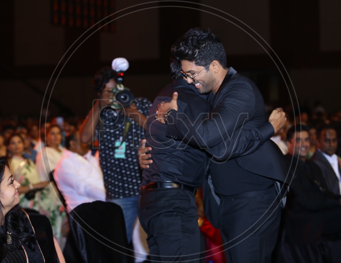 Tollywood Actor Allu Arjun giving a hug to Surya