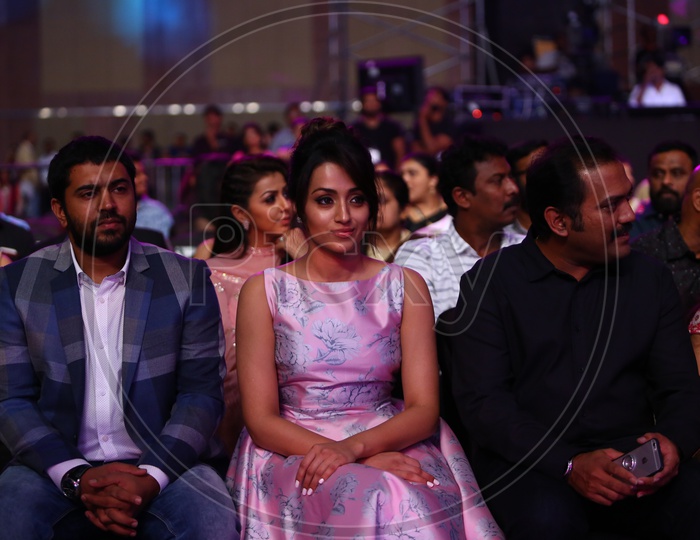 Tollywood Actress Trisha sitting alongside Actor Nivin Pauly during Filmfare Awards South 2017