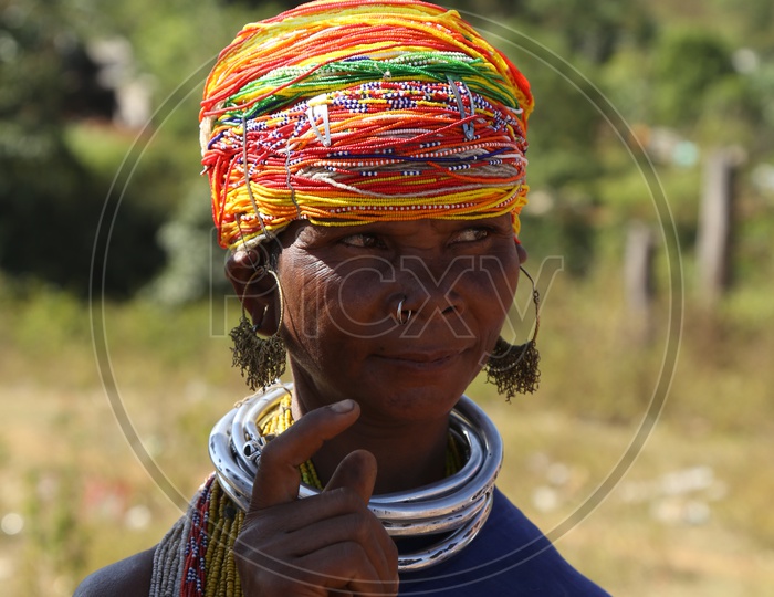 Portrait Of a Bonda Tribal Woman Selling Handmade Art Crafts In a Local Market  in Tribal Villages of Andhra Odisha Border