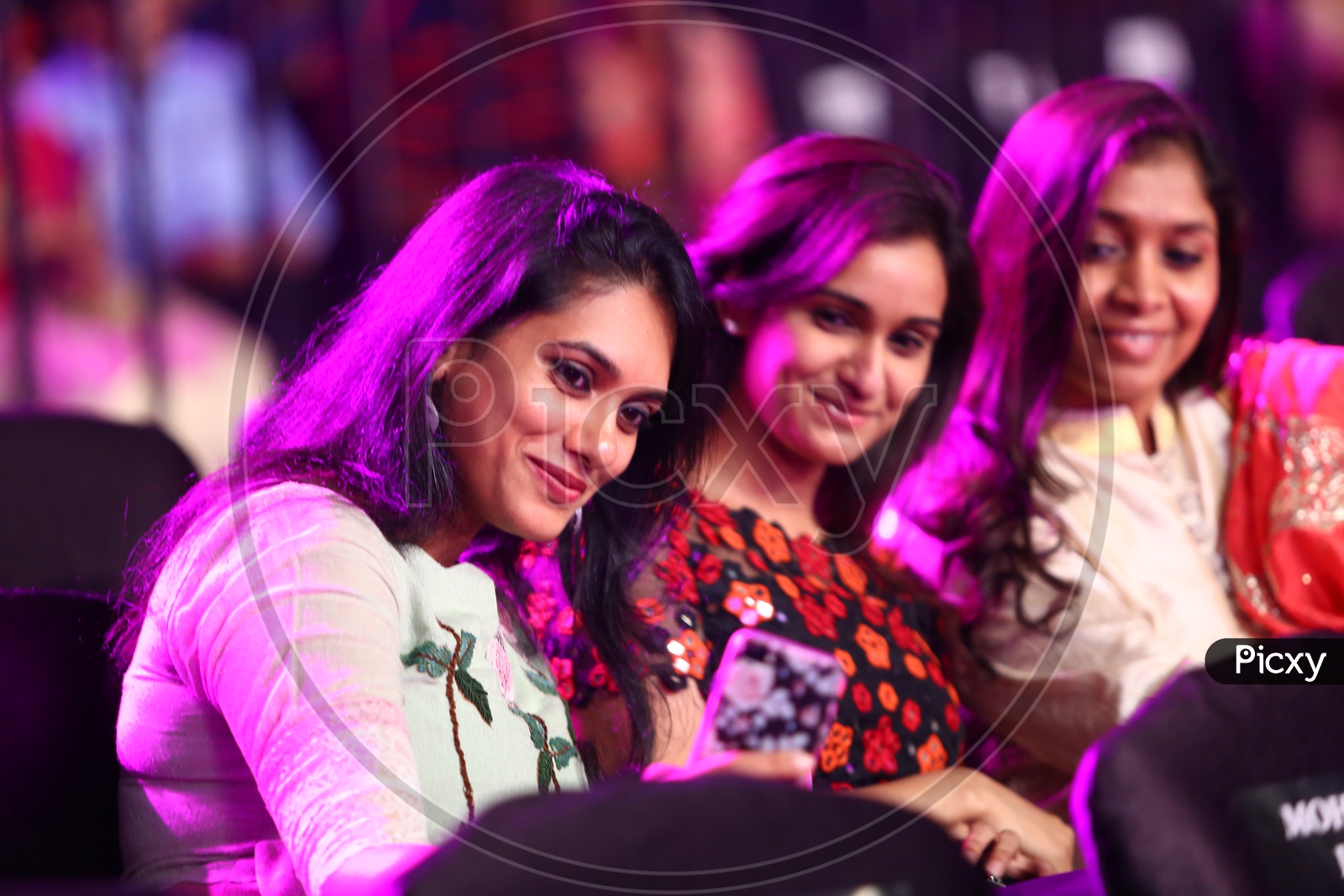 Young Indian Girls Sitting At  Film Fare Awards Event