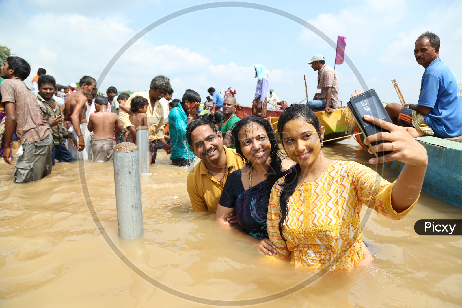 Indian Hindu Devotees Taking Holy Bath In River krishna During Pushkaralu