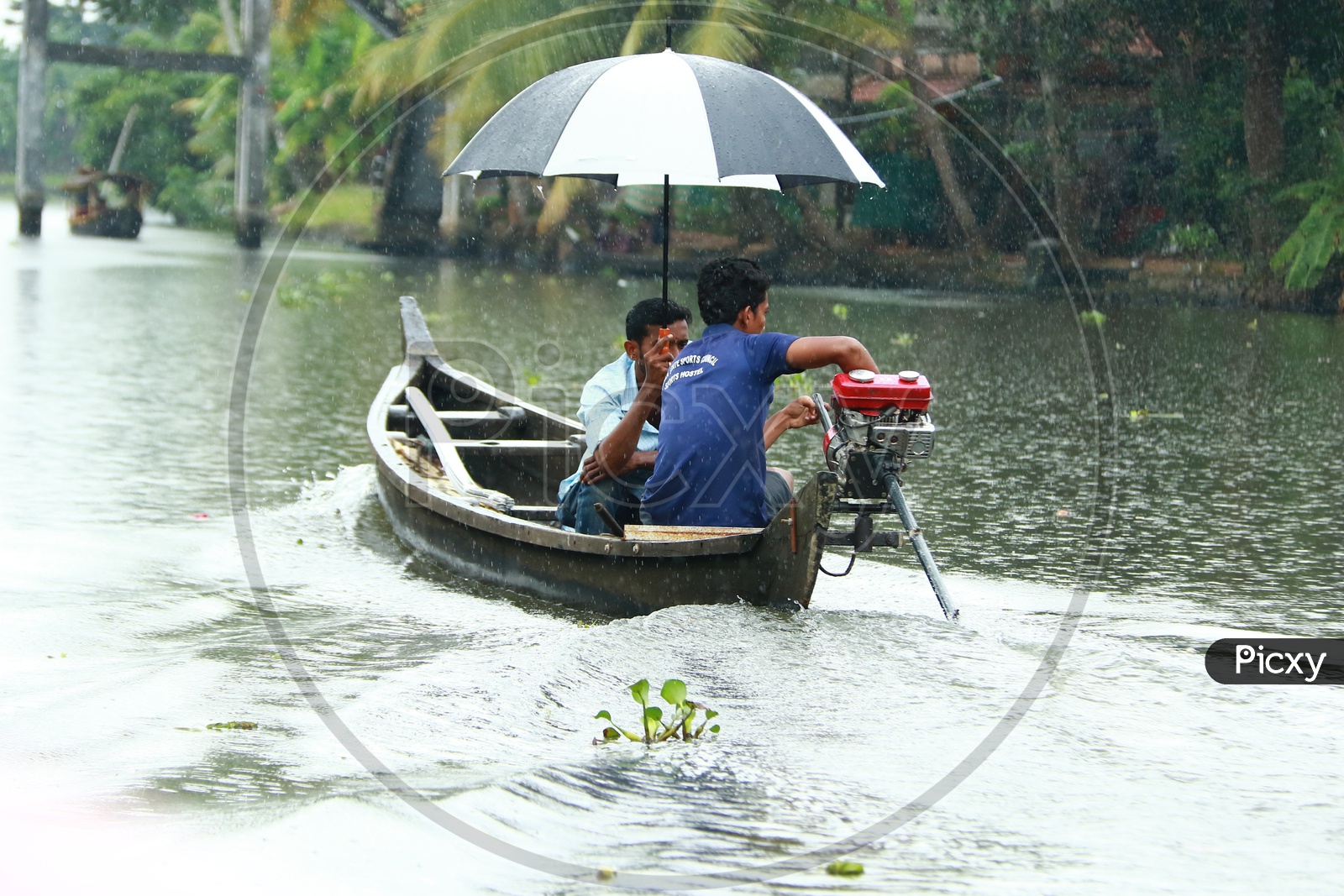 Tourists Taking Motor Boat Rides In Kerala Back Waters