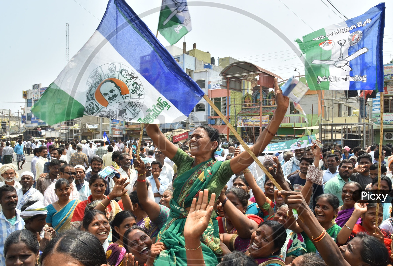 Women cheering for YSRCP Party during election campaign
