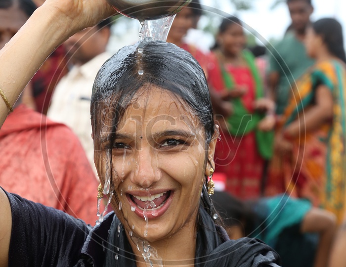Indian Hindu Girl Devotees Taking Holy Bath In River krishna During Pushkaralu