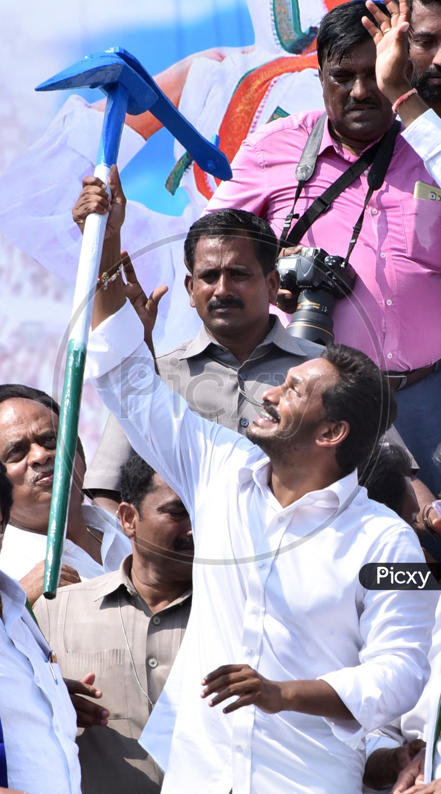 AP CM YS Jagan Mohan Reddy holding farmer's plough