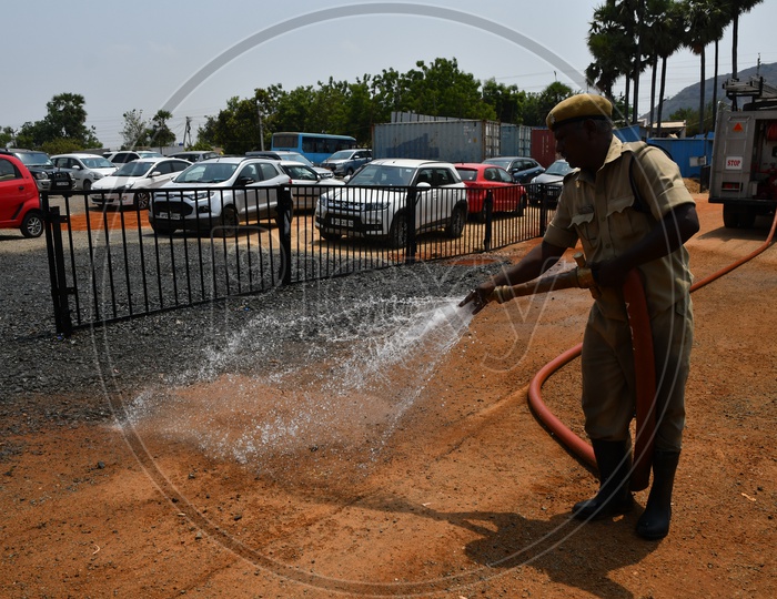 Firefighters Pouring Water on Road at VIP Car Parking, AP Chief Minister Y.S. Jaganmohan Reddy Residence