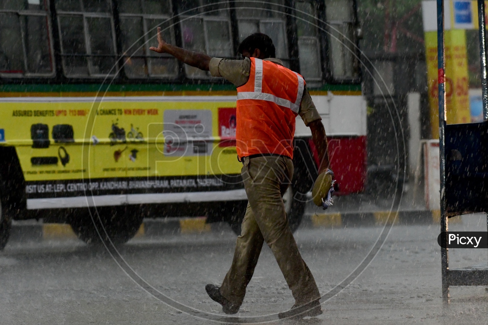 AP Traffic Police controlling traffic during Rain