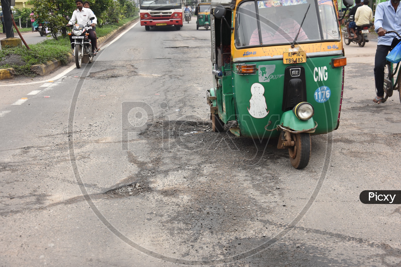 Damaged Road With Potholes Due To Heavy Rains In Vijayawada