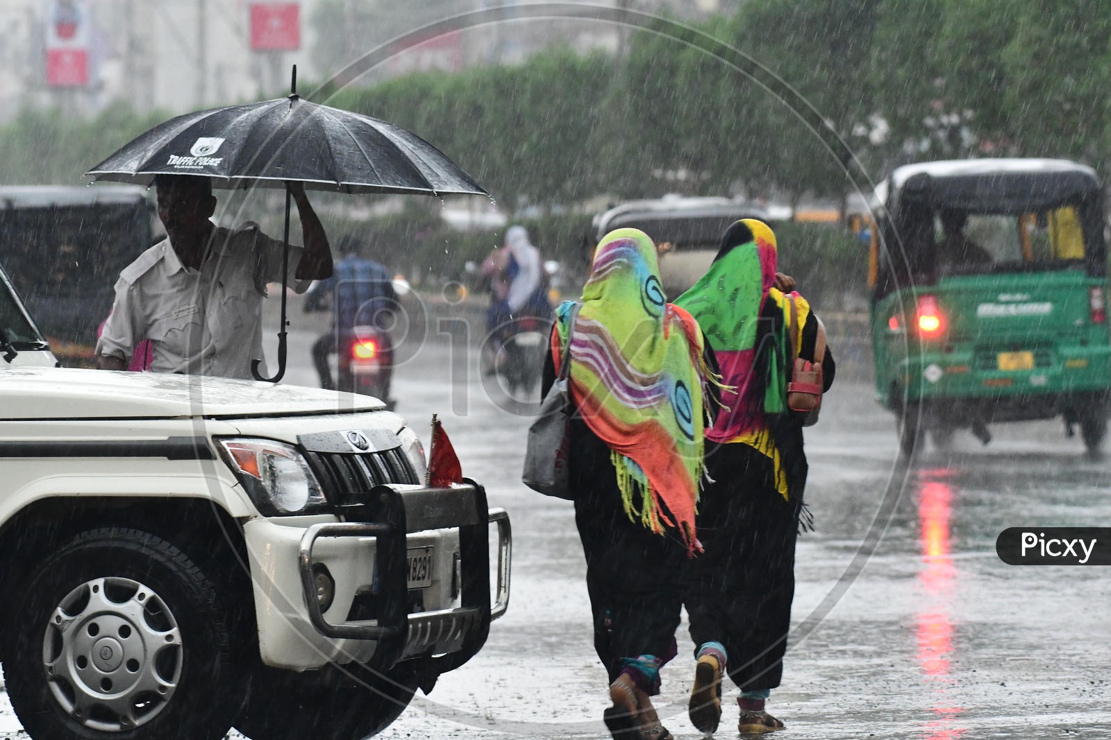 Muslim Woman Walking on Vijayawada Roads In Heavy Rains