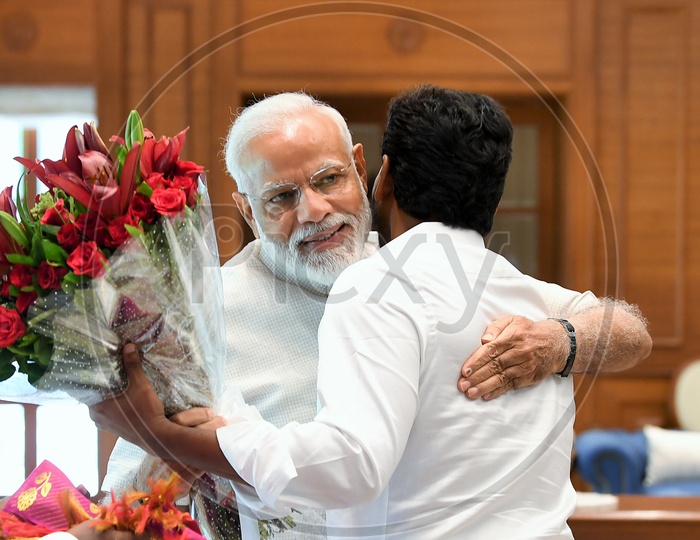 PM Narendra Modi hugging AP CM YS Jagan Mohan Reddy