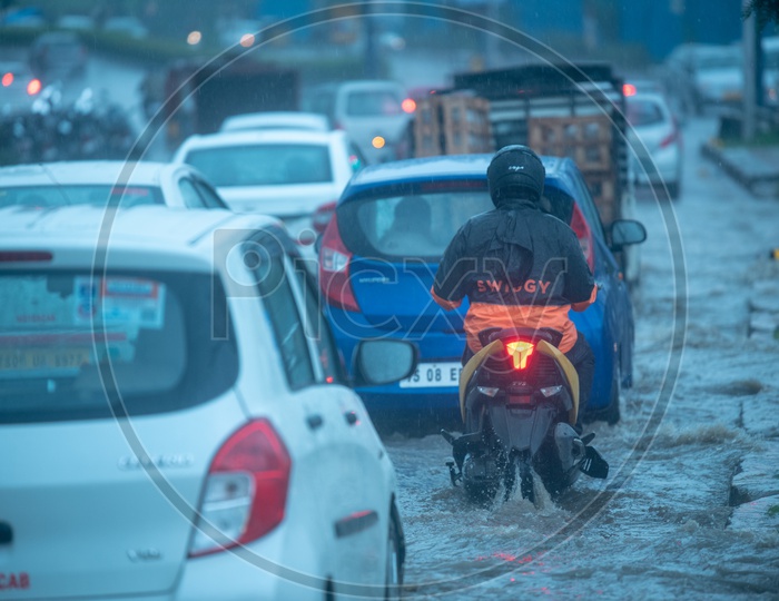 Swiggy Delivery Agent  Carrying Food In heavy Rain  on Hyderabad  Roads