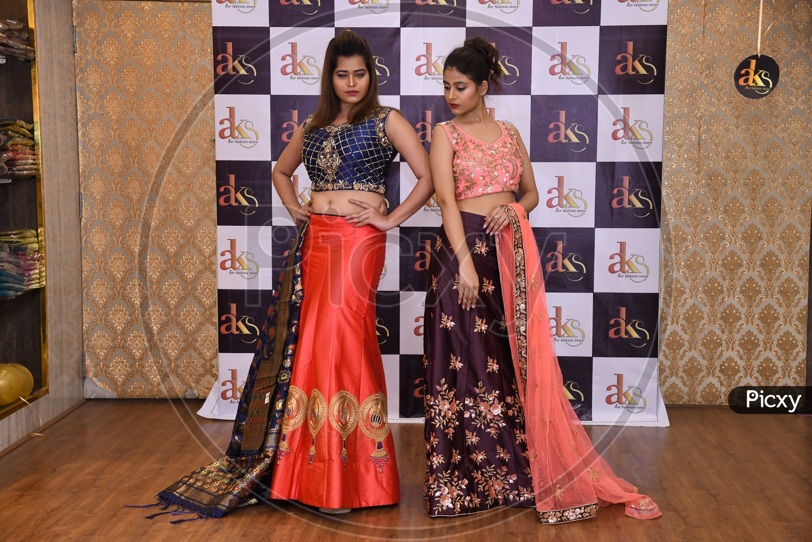 Indian Models Wearing New Collection of Traditional Dresses And Showcasing   In a  Fashion Show