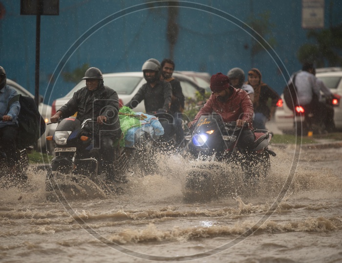 Bike Commuters Running on Heavy Flooded Roads in Hyderabad Due To Monsoon Heavy Rainfall
