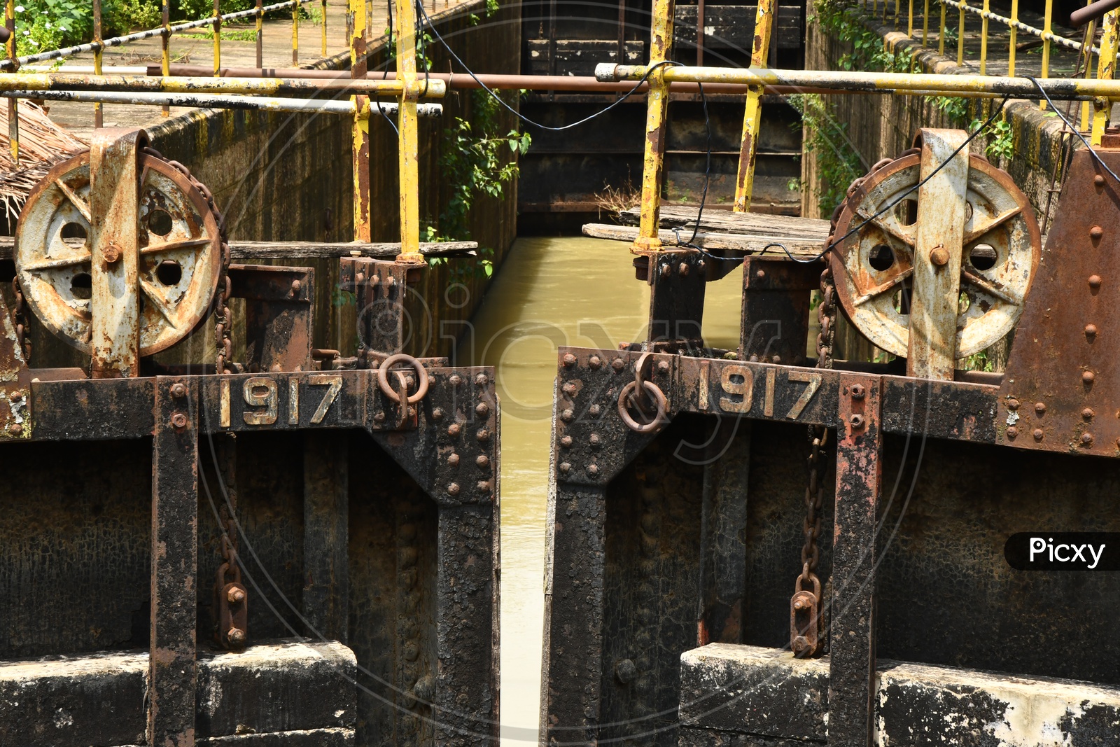 Rusted Iron Check Dam Gates With Levers
