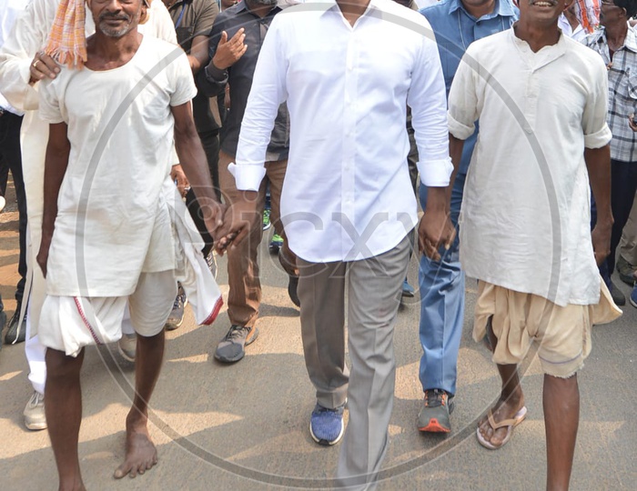AP CM YS Jagan Mohan Reddy walking along with farmers