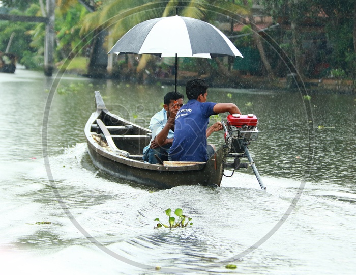 Tourists Taking Motor Boat Rides In Kerala Back Waters