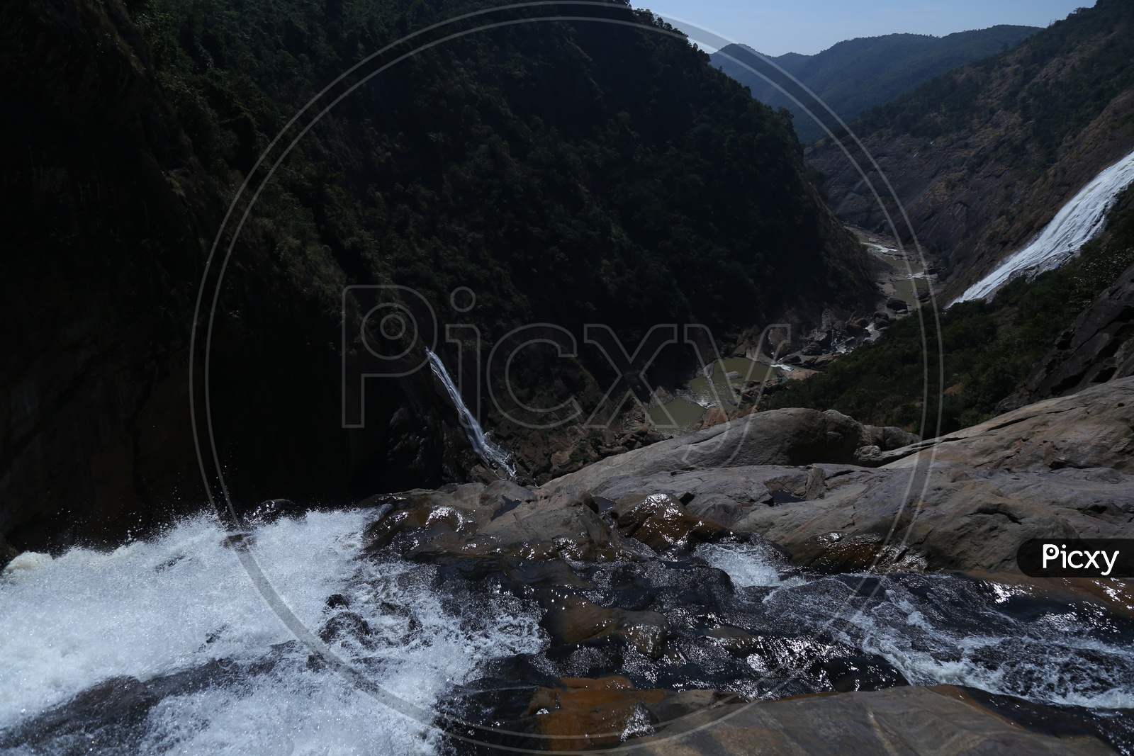 A Beautiful View Of Duduma Water Falls With Water Streams  Or Currents Flowing over Rocks And Valleys