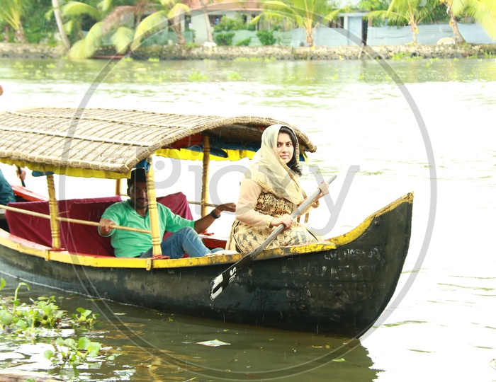 Tourists Taking Boat Rides in Kerala Back Waters