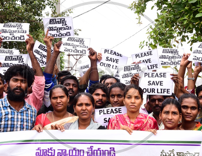 People Protesting With Placards  in a Rally
