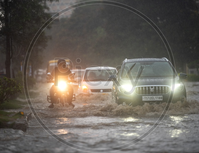 Commuting Vehicles On Flooded Roads in Hyderabad Due to  Monsoon Heavy Rainfall