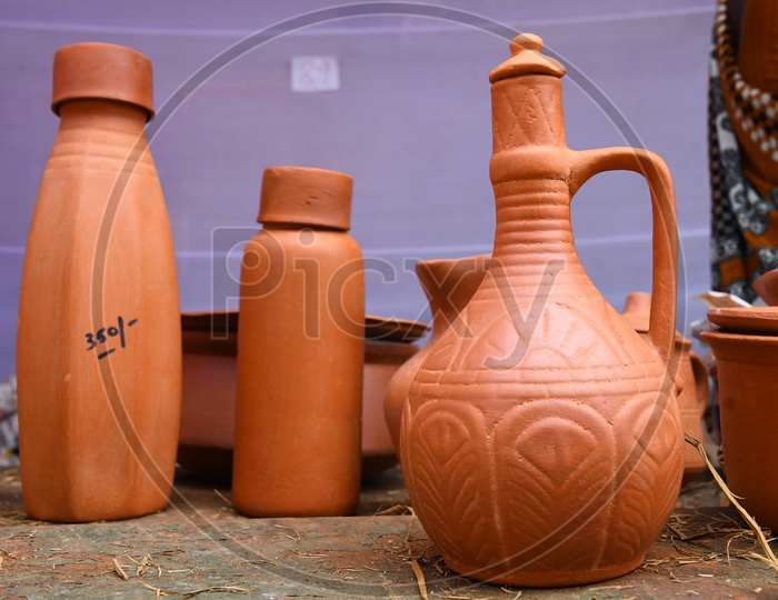 Earthen Clay Ware Or Utensils Selling In a Stall At A Flea Market