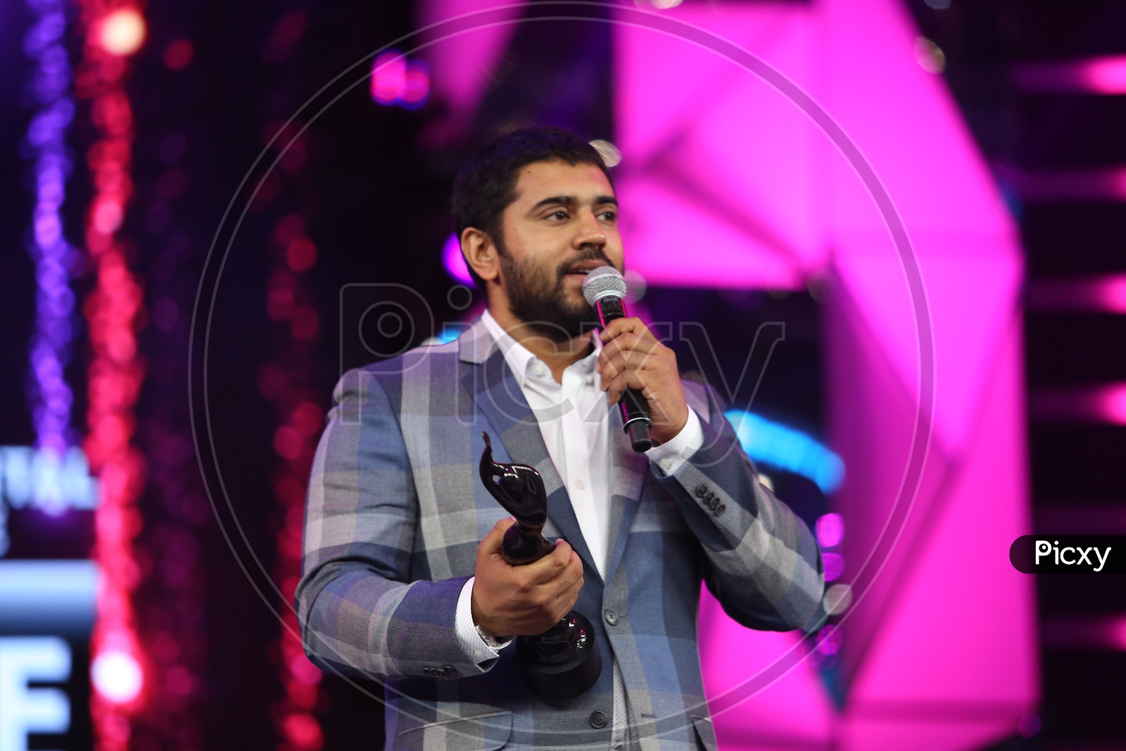 Actor Nivin Pauly after receiving a filmfare award