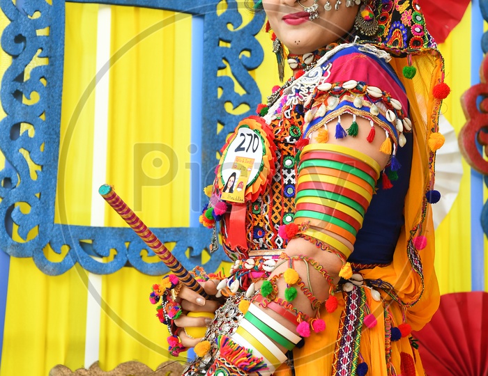 Beautiful Indian Woman in Traditional Dress At Garba Dandiya Raas Event as a Part Of Durga Navratri