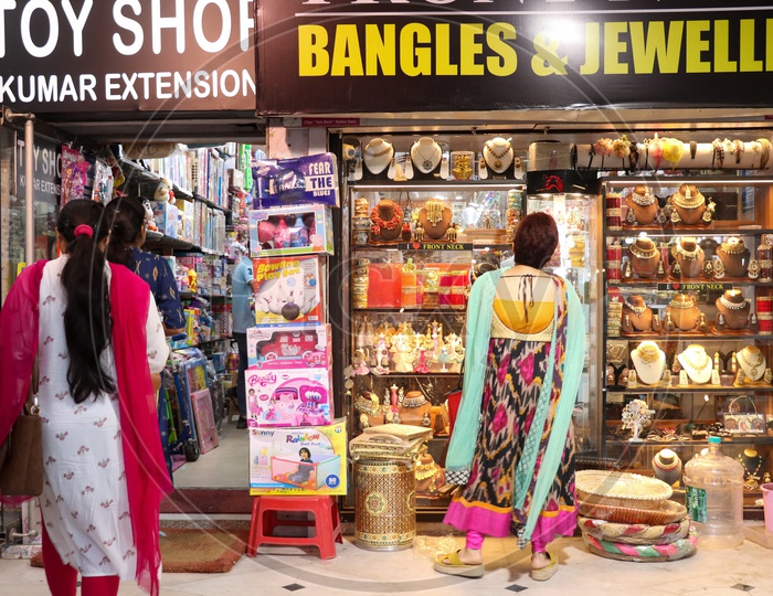 Woman Shopping At Bangles And Jewelery Stores