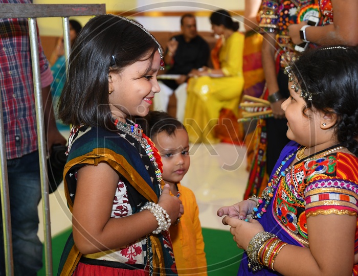 Indian Children Dressed In traditional Dhandiya Style For Garba Dhandiya Raas Event