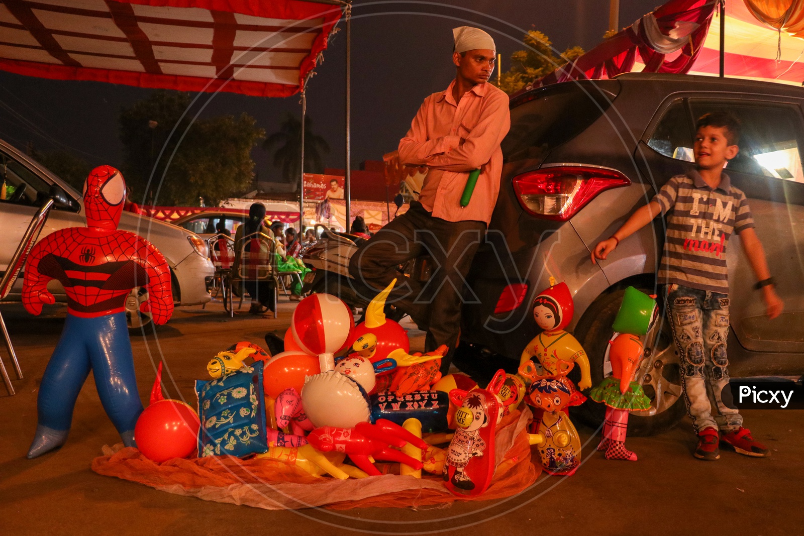 A street vendor selling plastic toys
