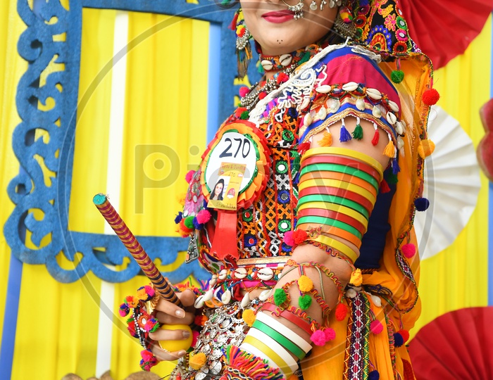 Beautiful Indian Woman in Traditional Dress At Garba Dandiya Raas Event as a Part Of Durga Navratri