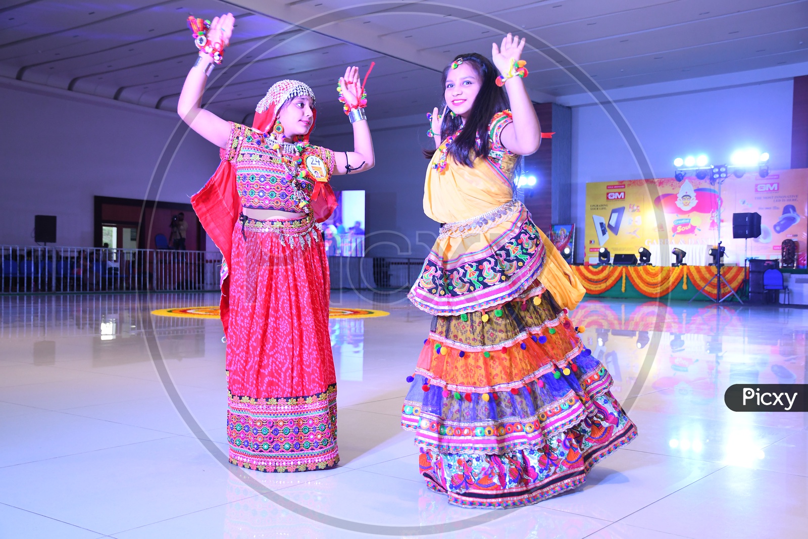 Beautiful Indian Woman Dancers At Garba Dhandiya Raas Event As a Part Of Durga Naratri Event