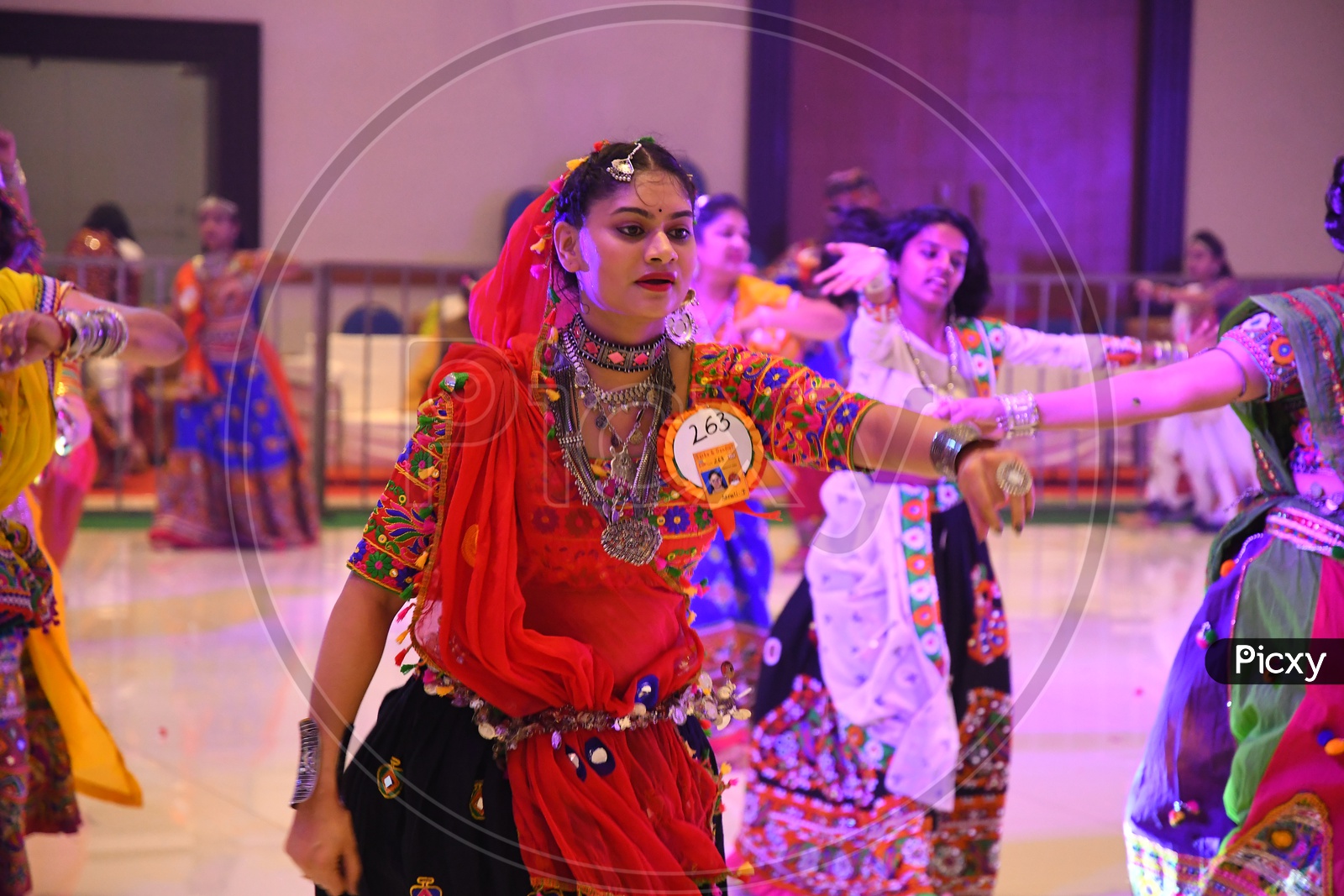 Image of Beautiful Indian Girls Playing Dandiya Dance At Garba Dandiya ...