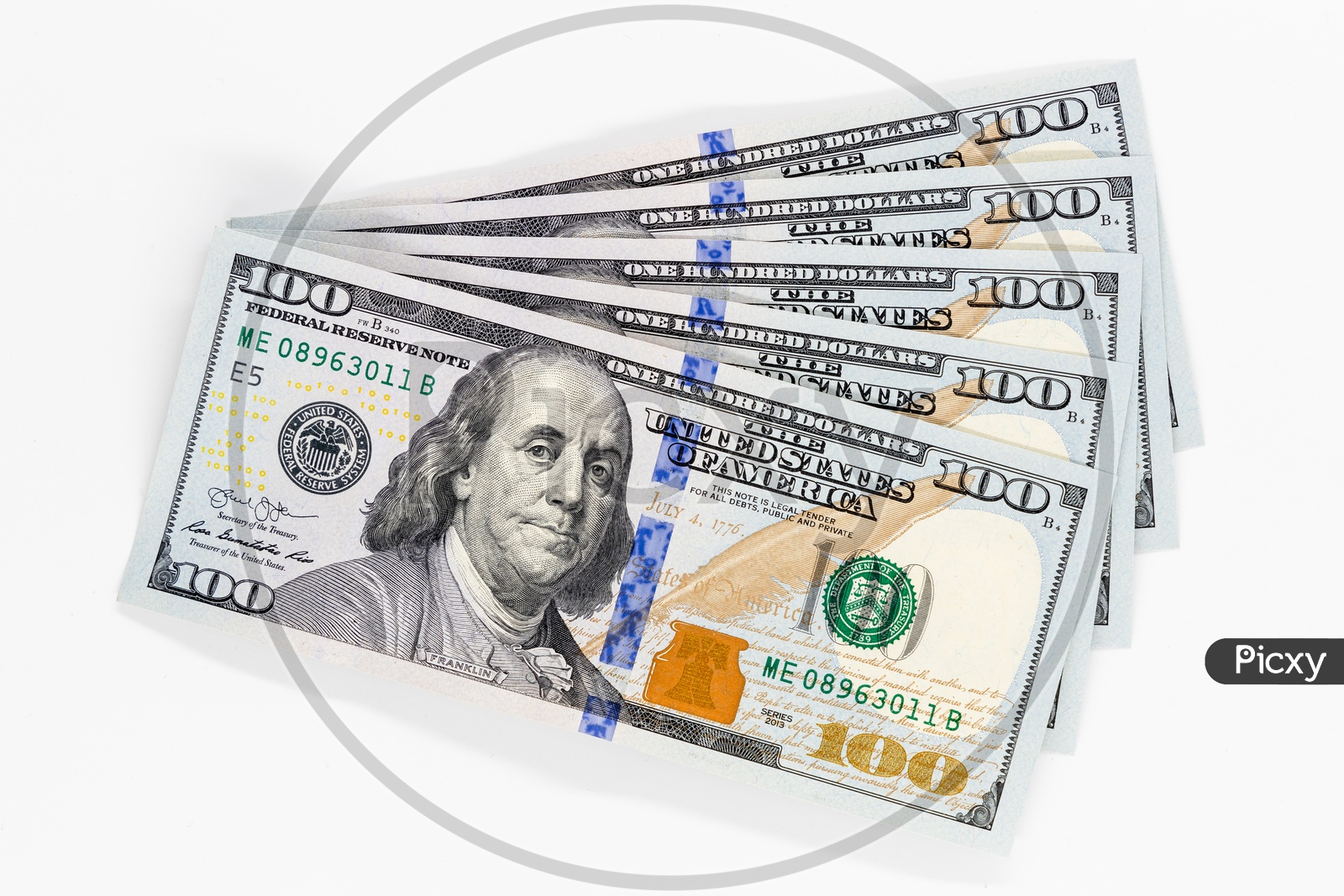 US 100 Dollar Currency Notes or Dollar Bills Closeup on an Isolated White Background