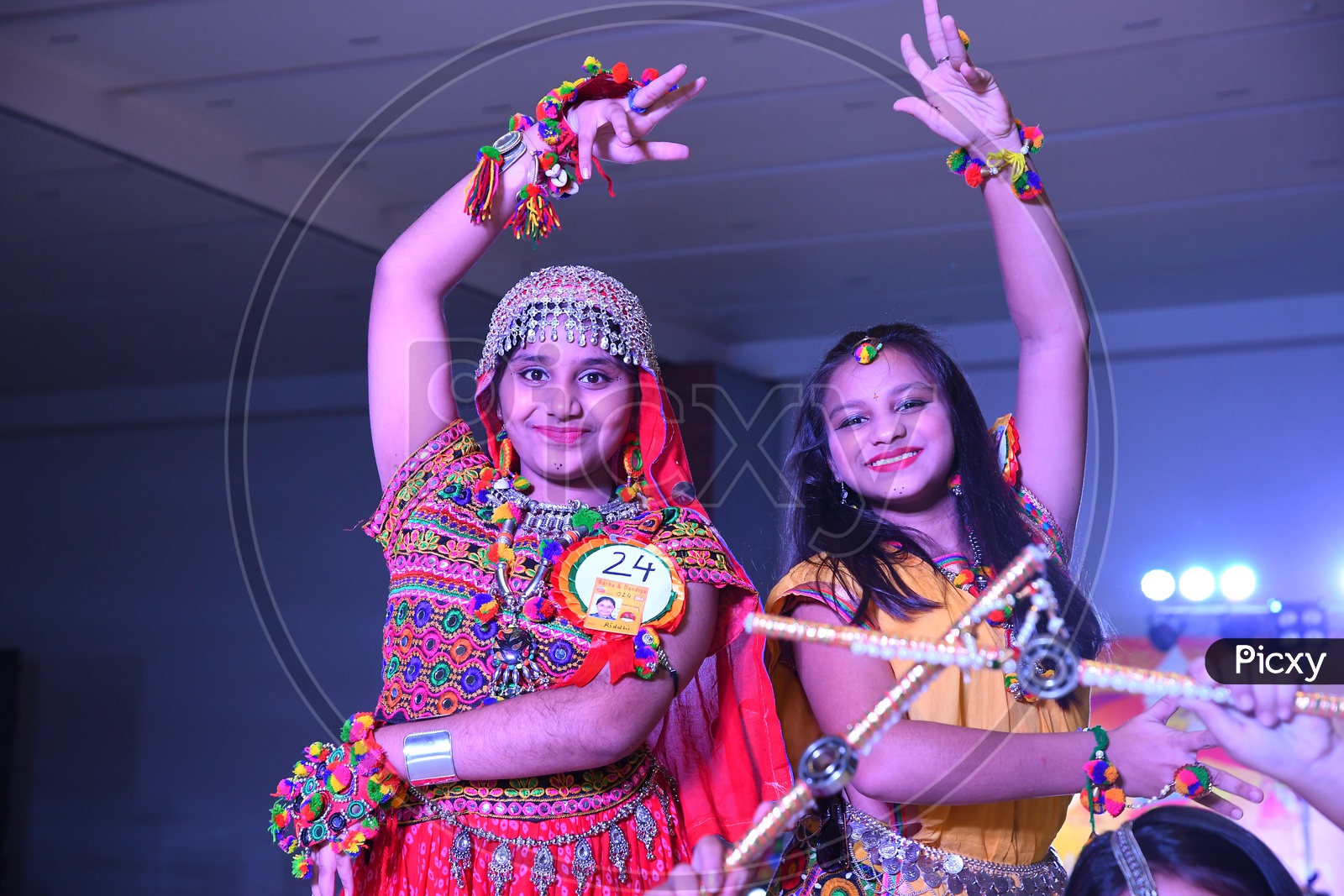 Beautiful Indian Girl  Dancers At Garba Dhandiya Raas Event As a Part Of Durga Naratri Event