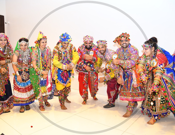 Indian Dancers Playing Garba Dandiya Raas As a Part of Durga Navratri