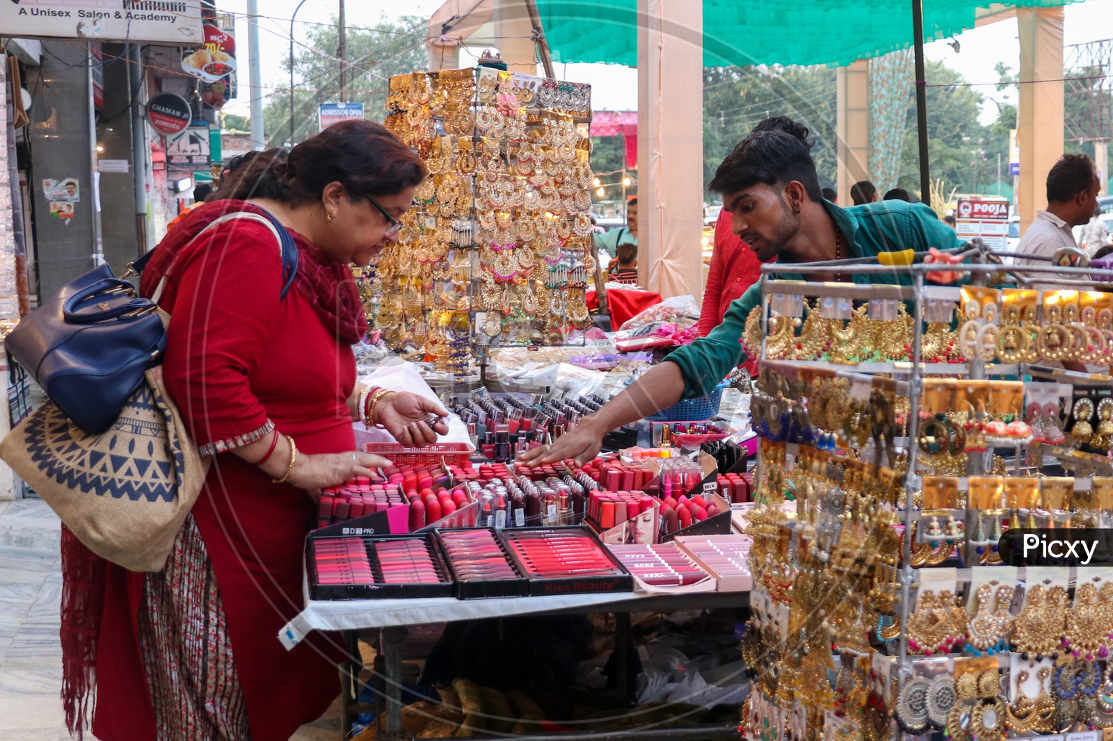 Woman Shopping Cosmetics At a Stall