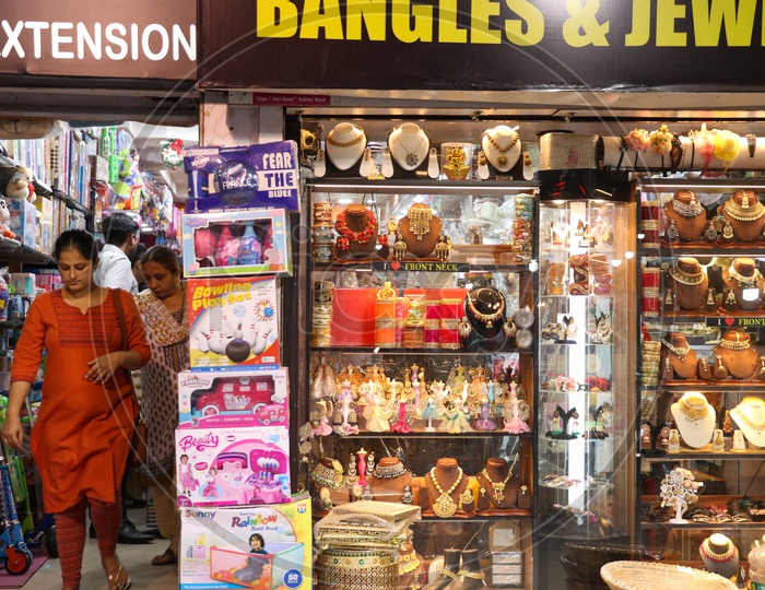 Woman Shopping at  Bangles And Jewelery Stores