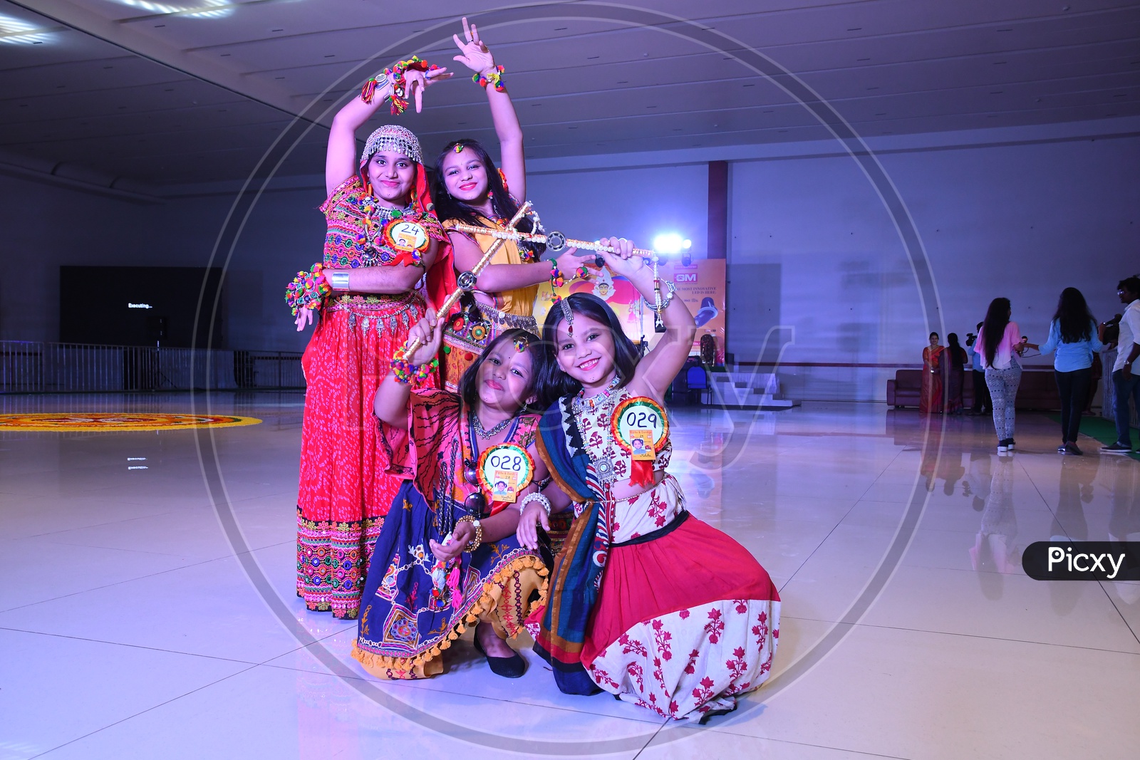 Beautiful Indian Girl  Dancers At Garba Dhandiya Raas Event As a Part Of Durga Naratri Event