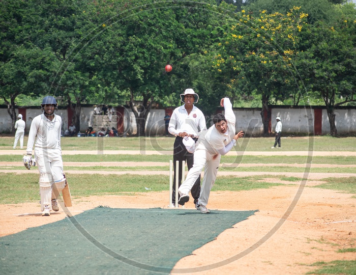 Young Indian Cricket Players Playing Cricket Match In a Ground
