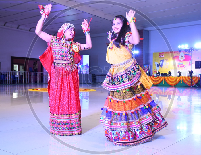 Beautiful Indian Woman Dancers At Garba Dhandiya Raas Event As a Part Of Durga Naratri Event
